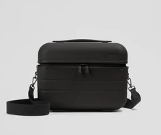 Front view of the Train Case with a detachable shoulder strap