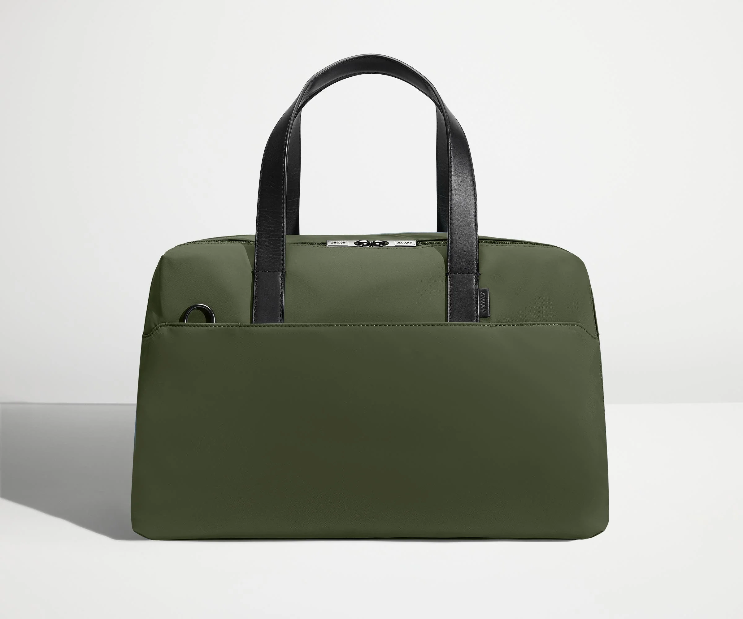 Front view of The Overnight Bag with leather straps up