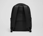 The Commuter Backpack back view showing padded shoulder straps and trolley sleeve feature