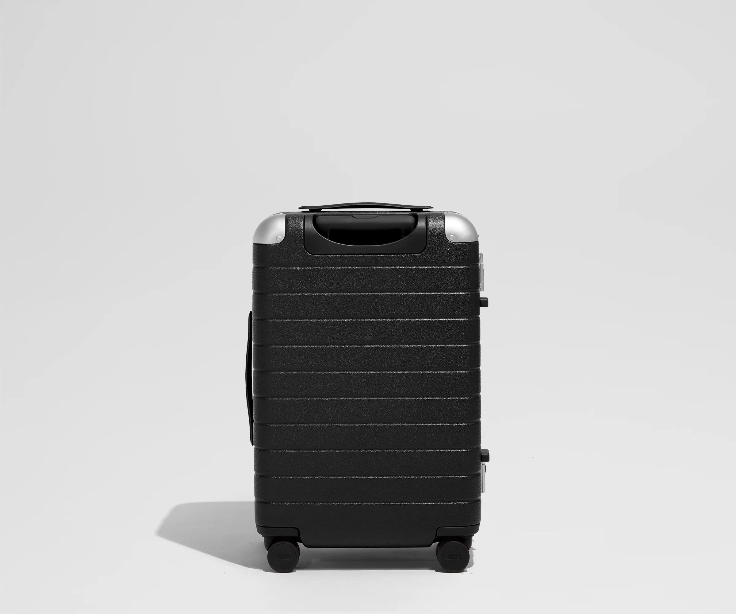 The Aluminum Edge Bigger Carry-On in Jet Black
