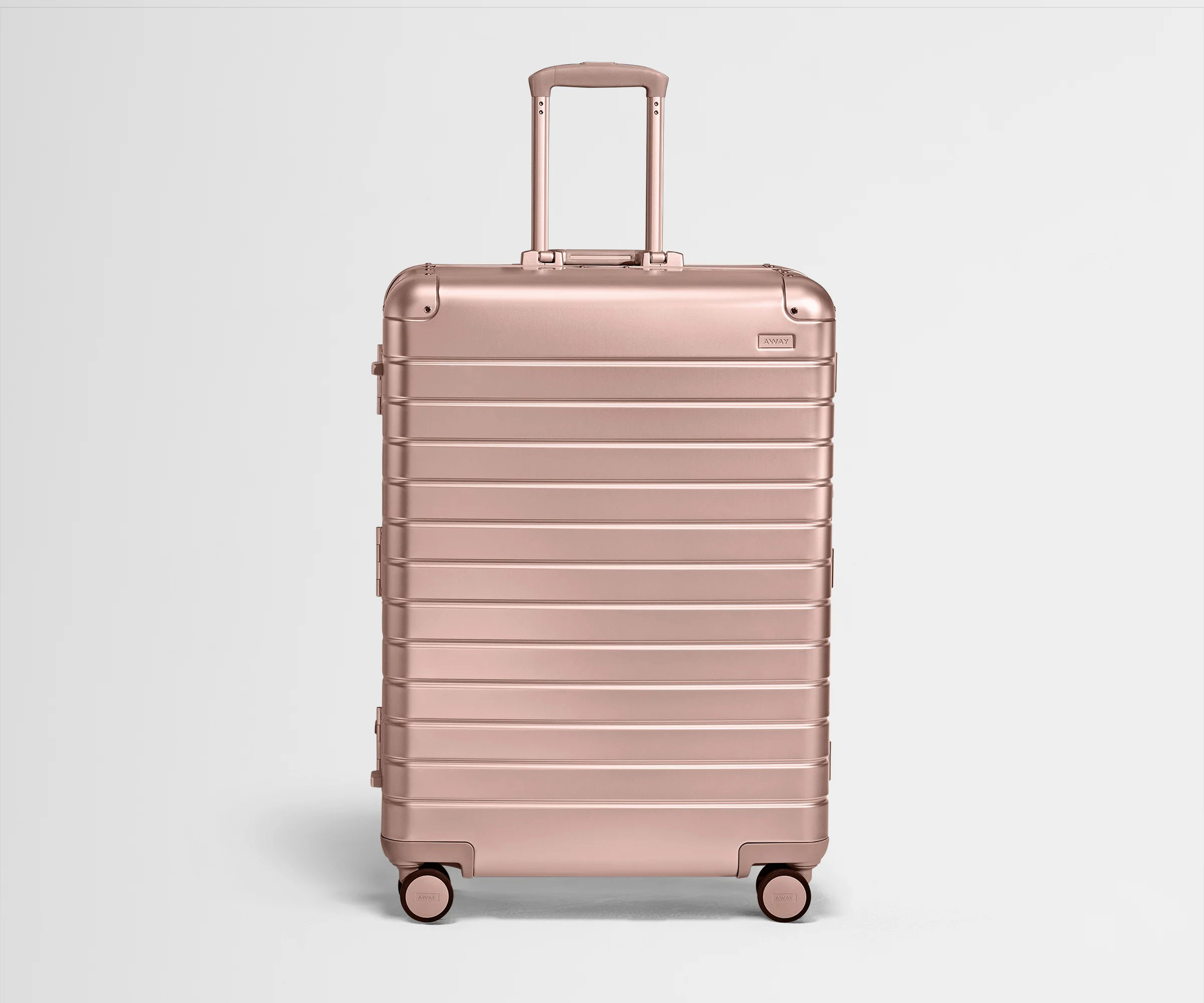 Front view of Large: Aluminum Edition luggage with handles raised