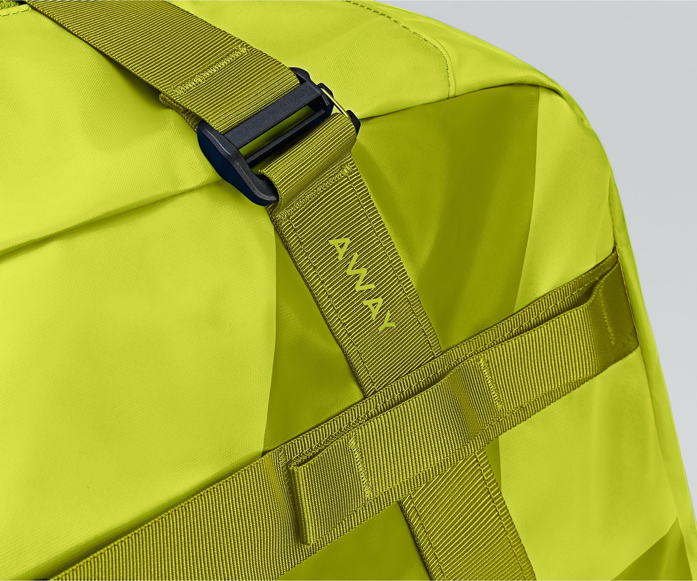 Close up view of the abrasion-resistant material and Away logo