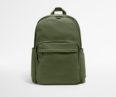 Green backpack on a light gray background