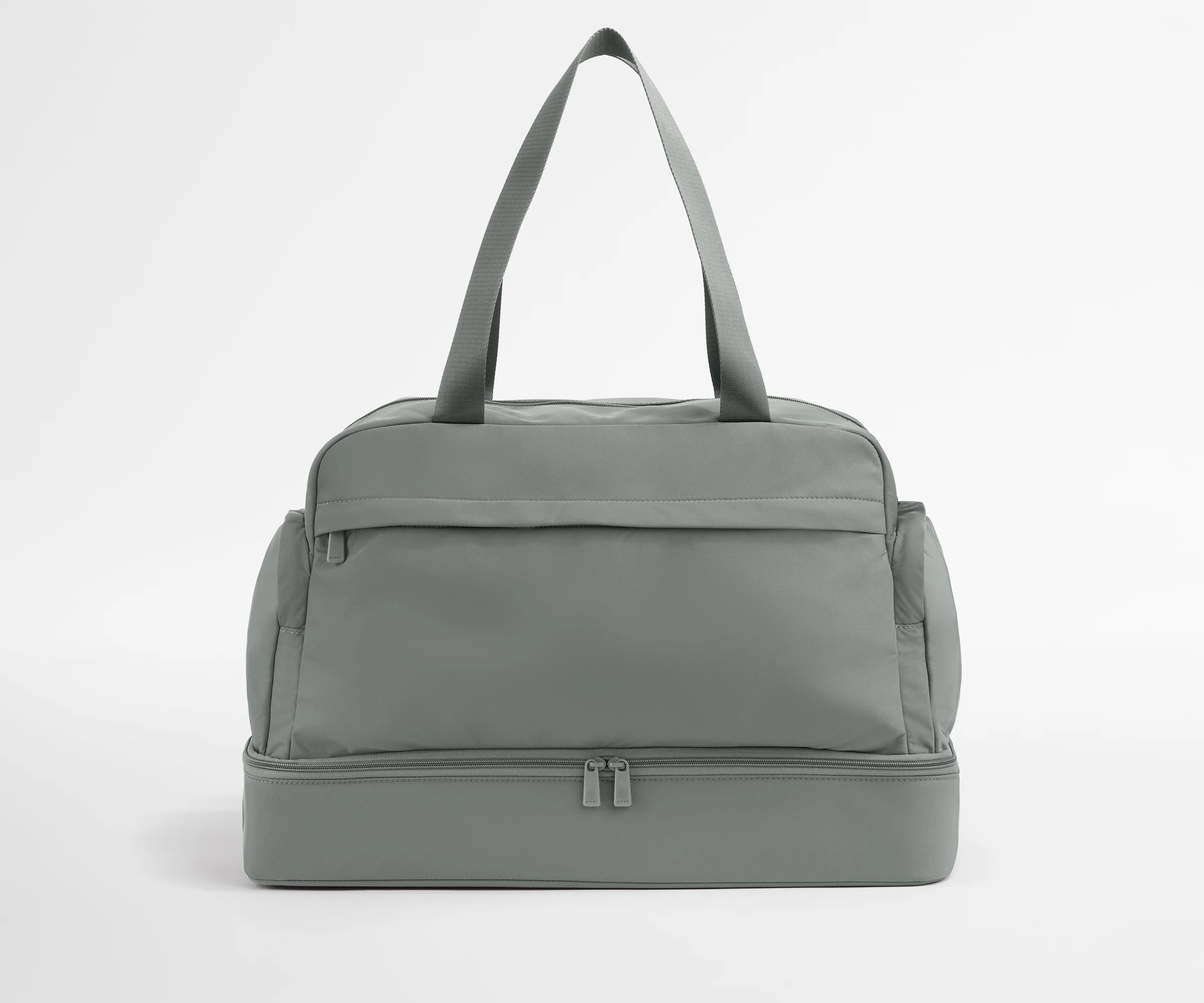 Gray duffel bag on a light gray background