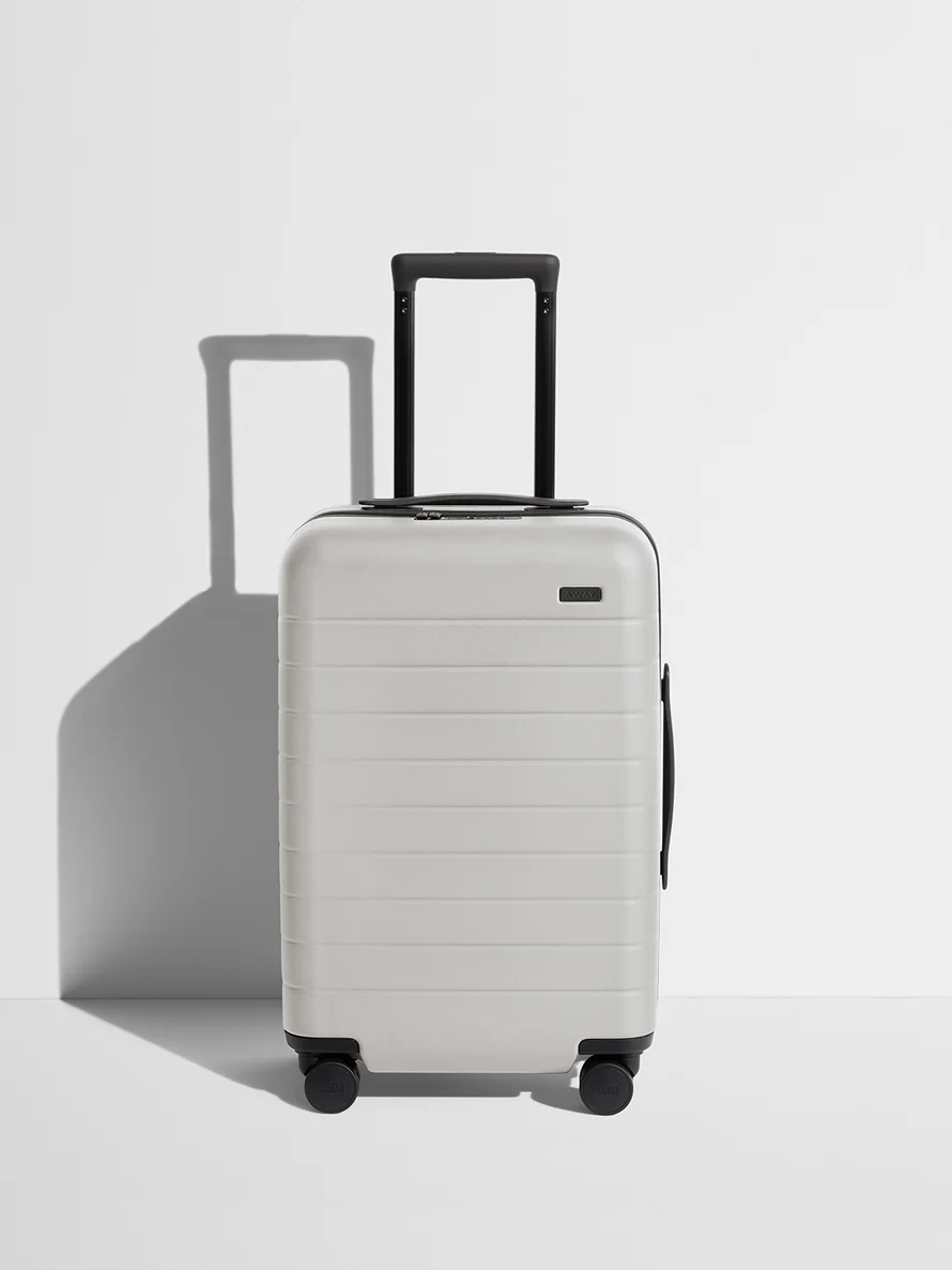 Front view of a Cloud Gray Carry-On suitcase
