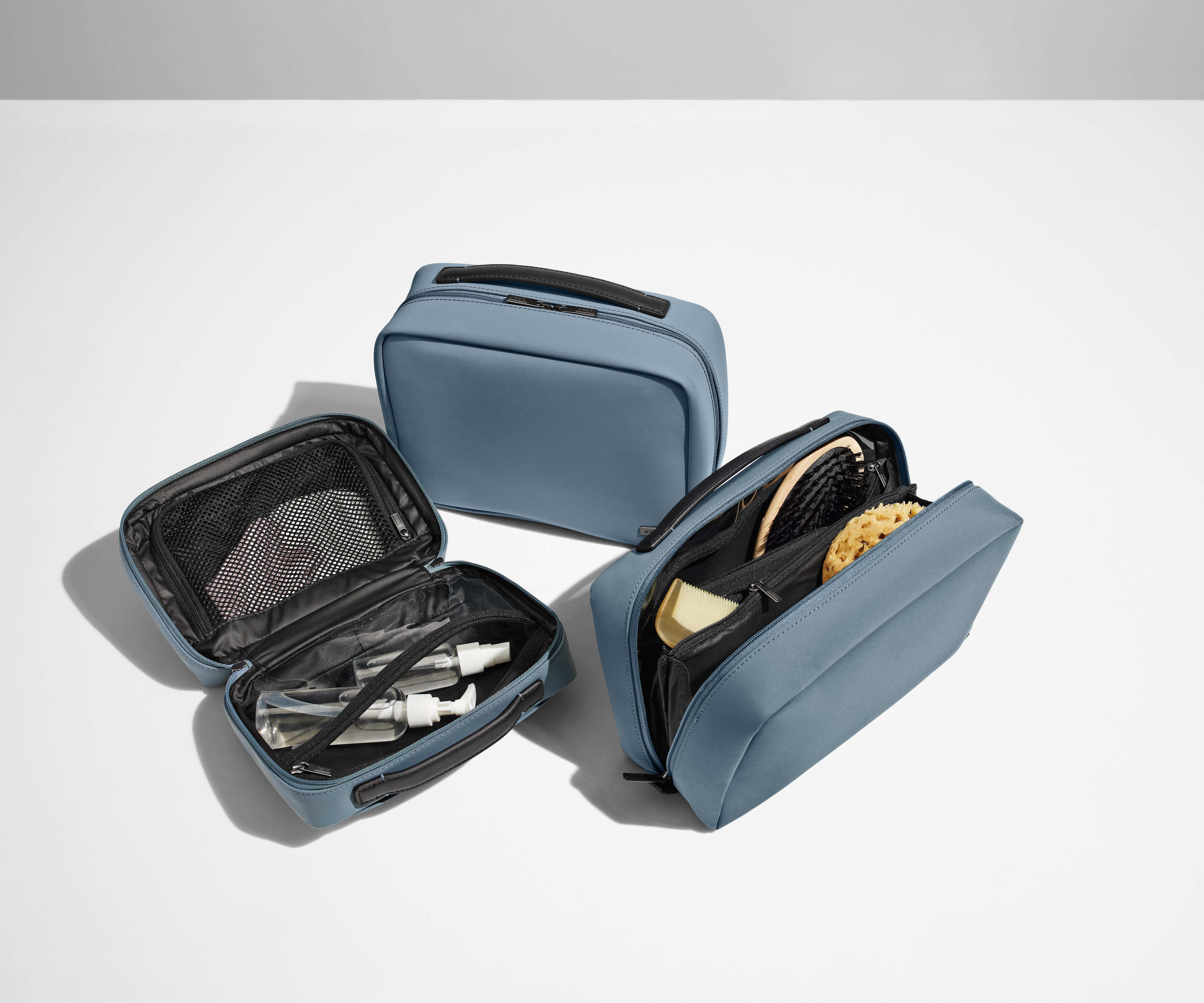 From left to right, size comparison between The Small Toiletry Bag, Hanging Toiletry Bag, and Large Toiletry Bag