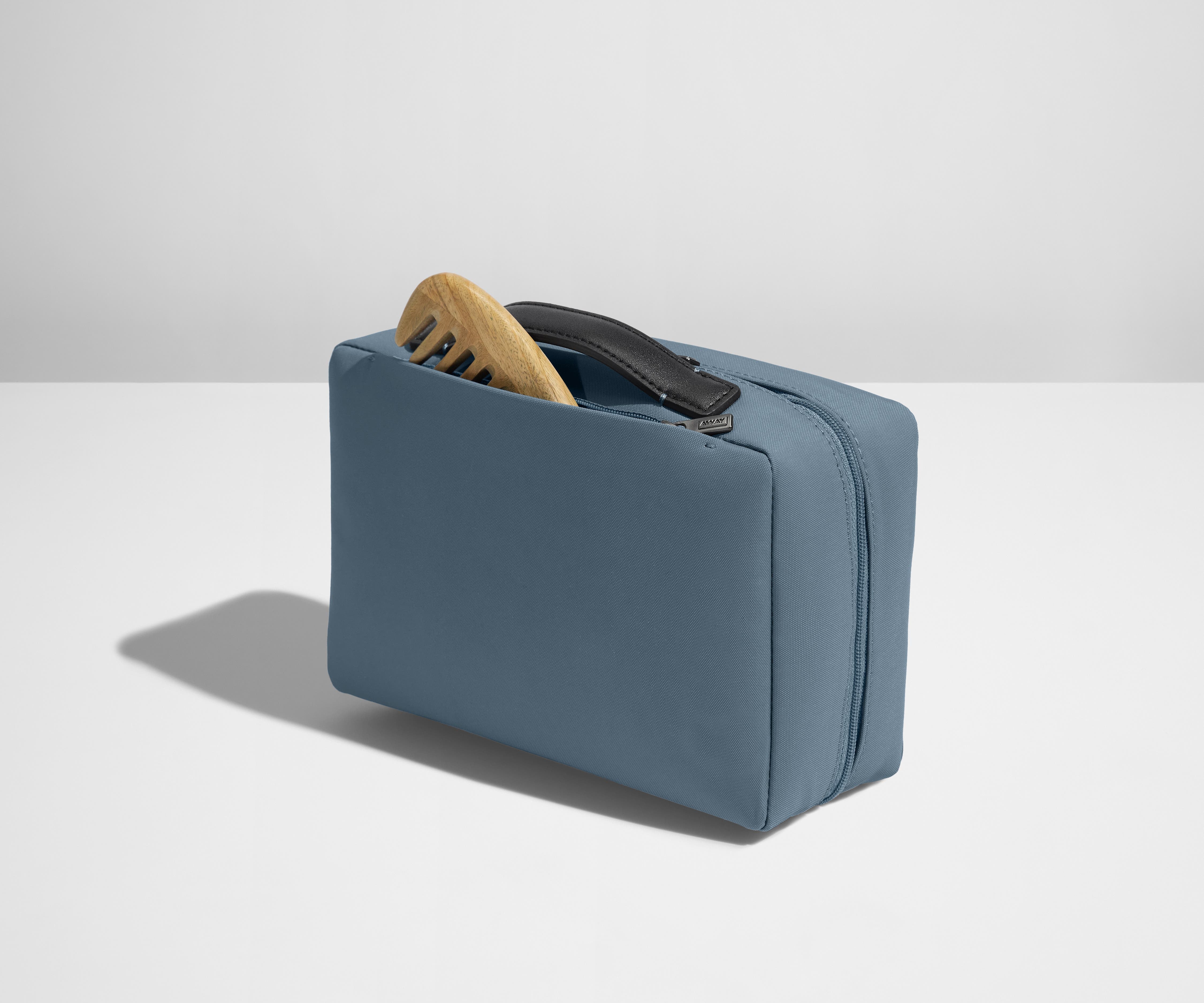 Comb packed in the exterior zip pocket