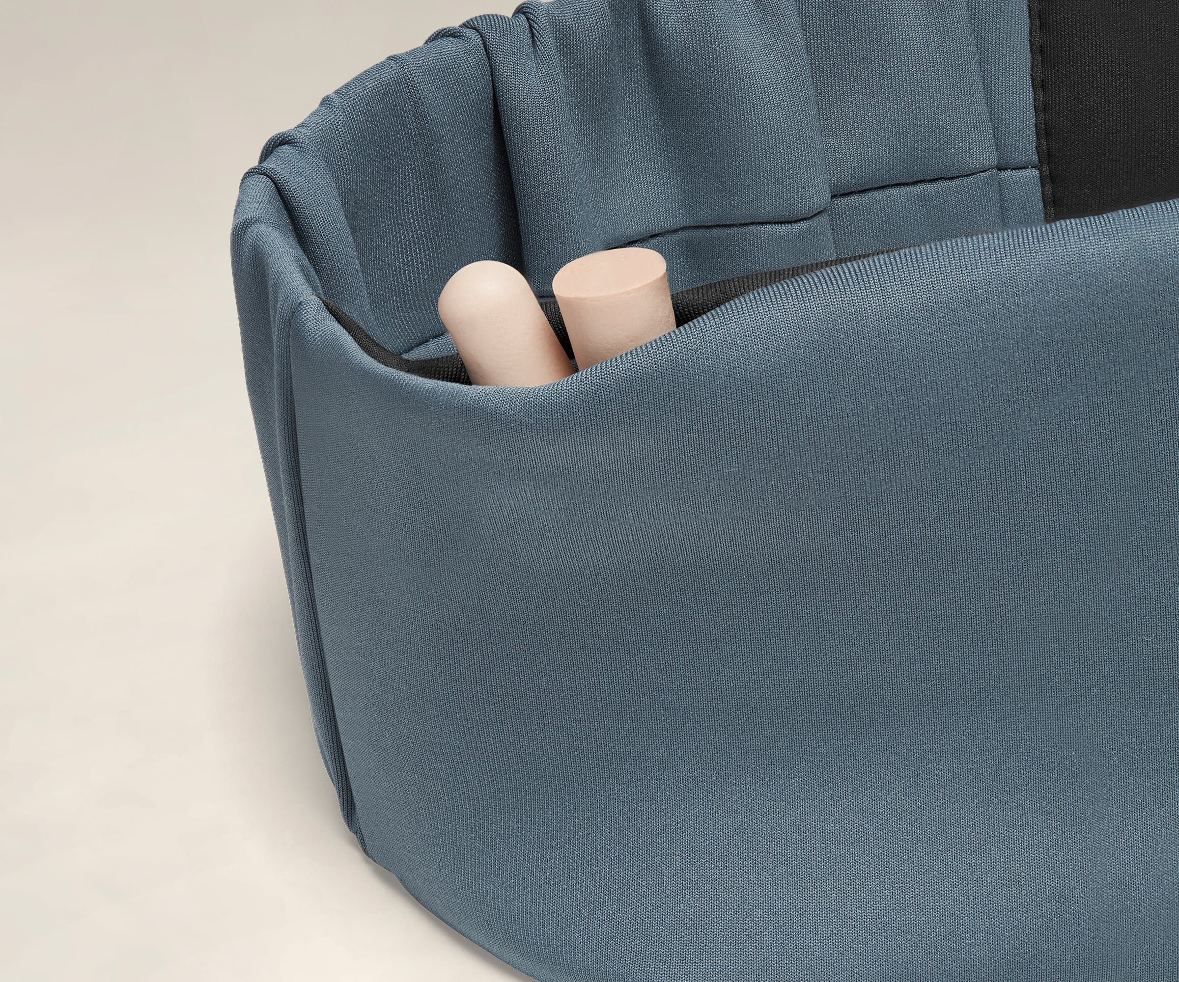 Discreet pocket with ear plugs