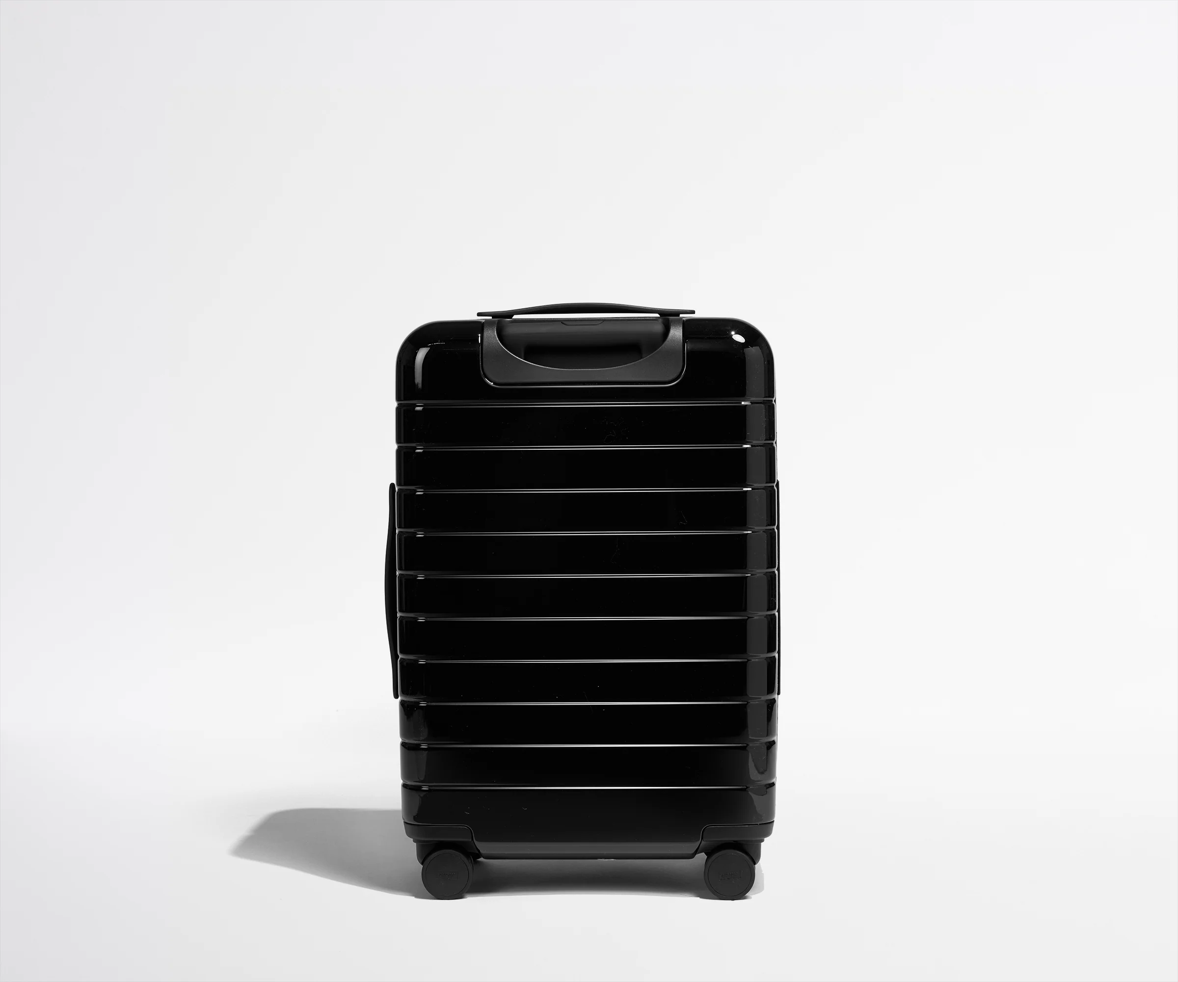 The Bigger Carry-On in Black Tie