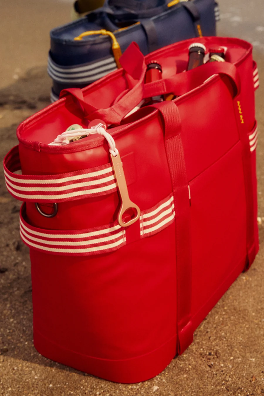 Red Cooler Tote on a sandy beach