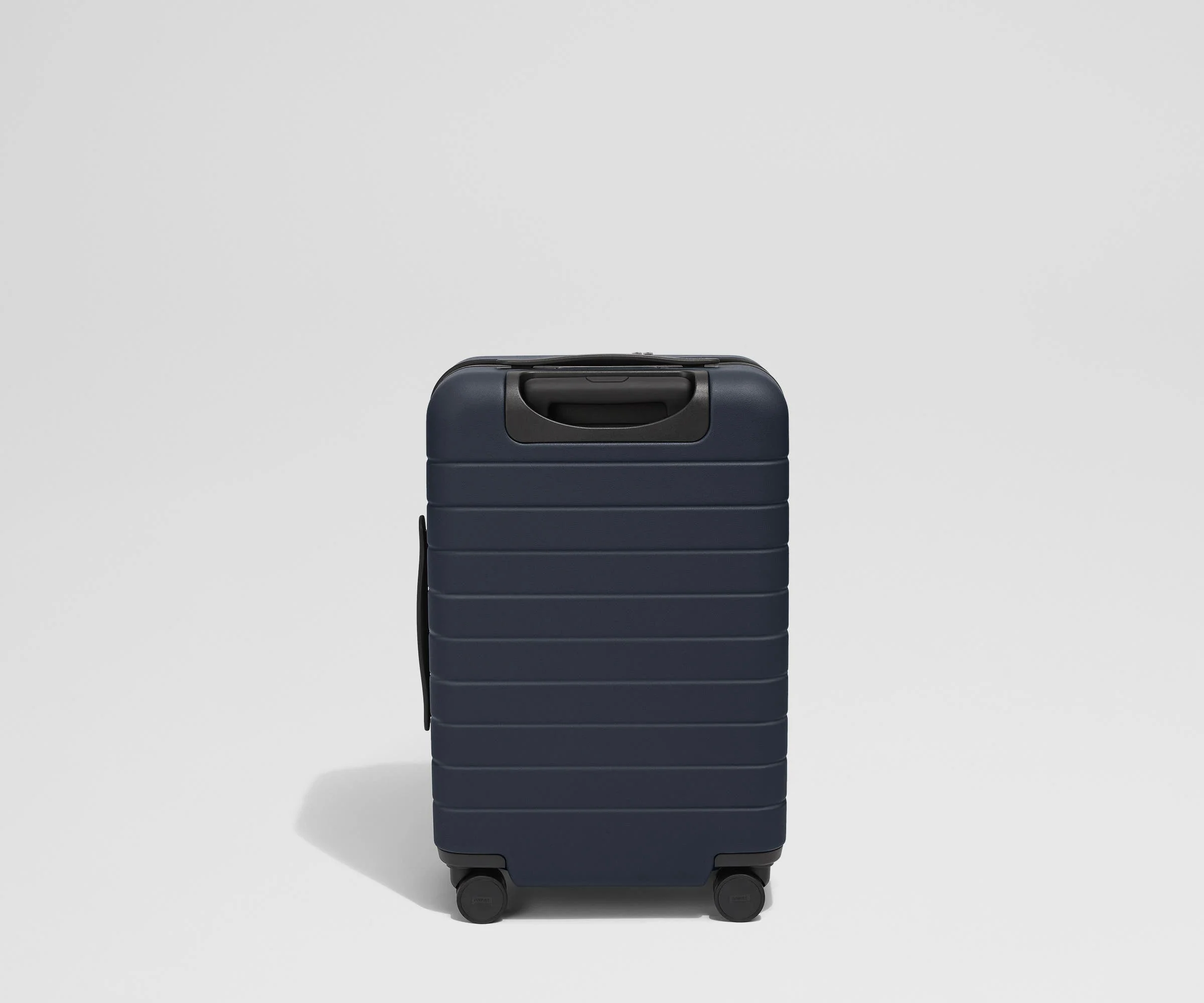 Back product view of The Front Pocket Carry-On suitcase in Navy Blue