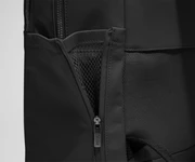 Close up view of the nylon material and exterior water bottle pocket