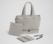 Tote with the included stroller clips, carry-all pouch, and changing pad