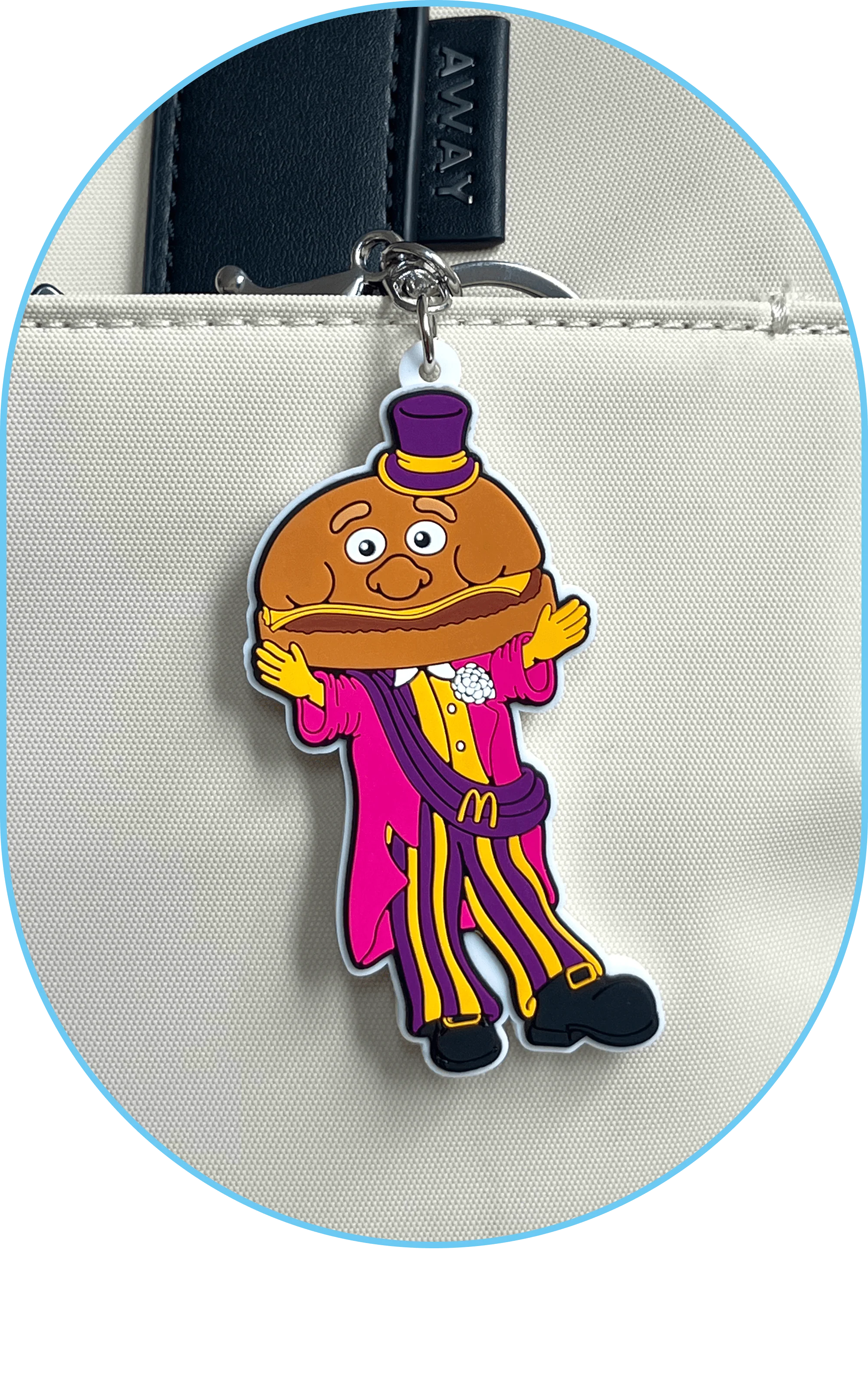 A Mayor McCheese luggage charm : Deluxe everything. Including the upgrade.